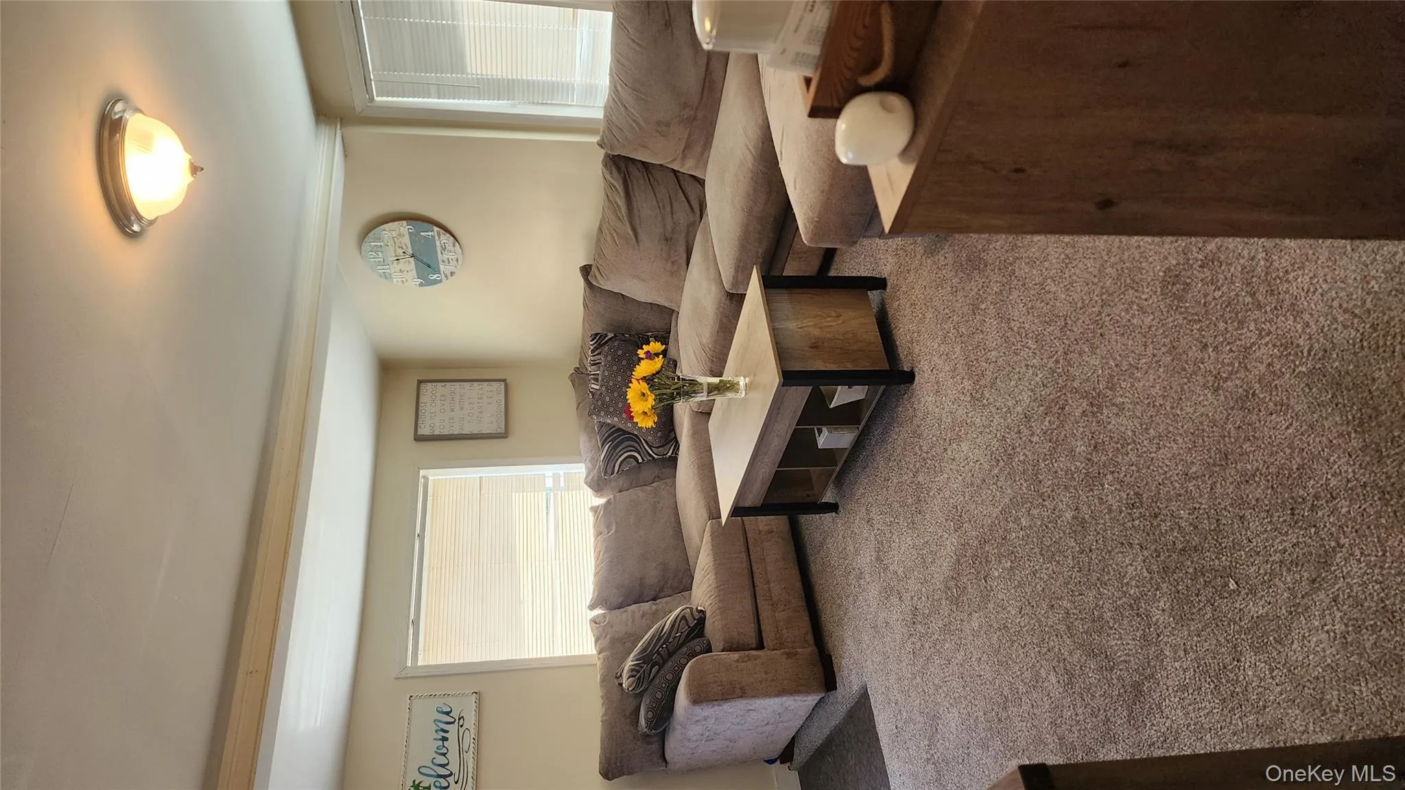 Living area with carpet Living area with carpet