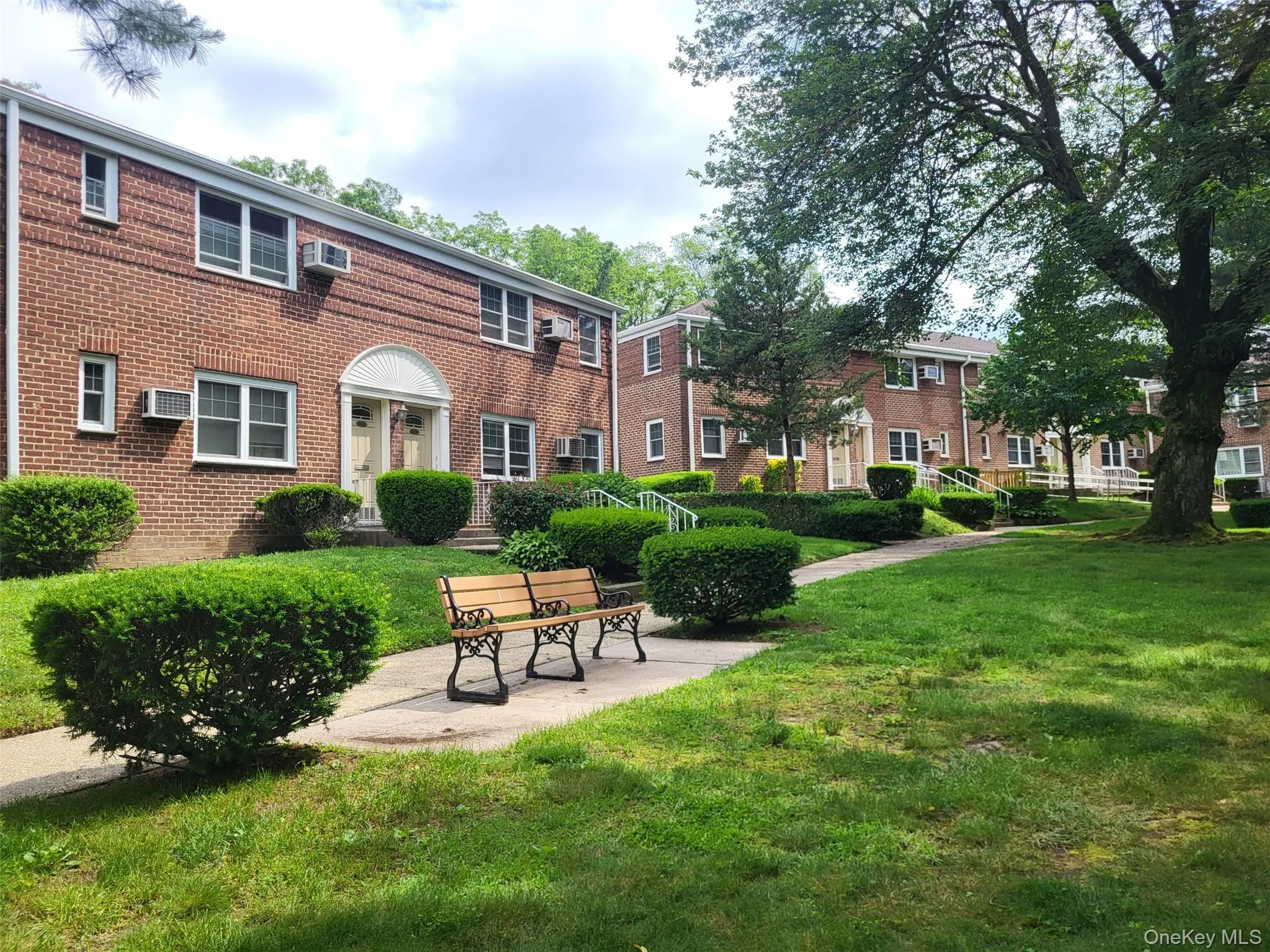 View of home's community featuring a yard View of home's community featuring a yard