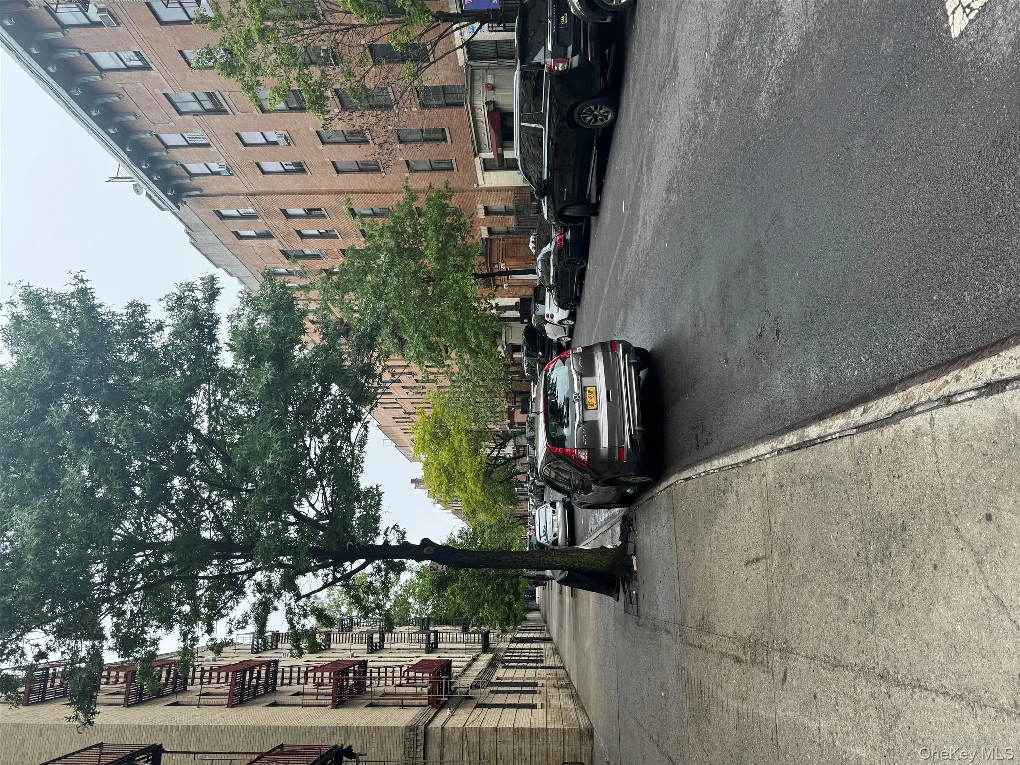 View of road with sidewalks and curbs View of road with sidewalks and curbs