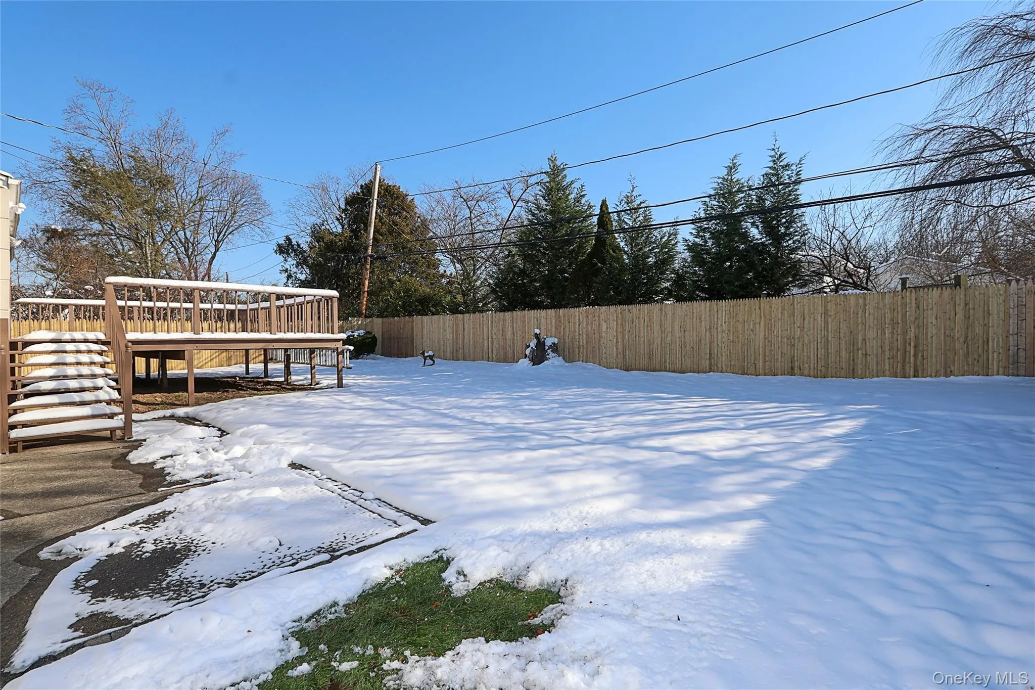 Yard featuring a deck Yard featuring a deck