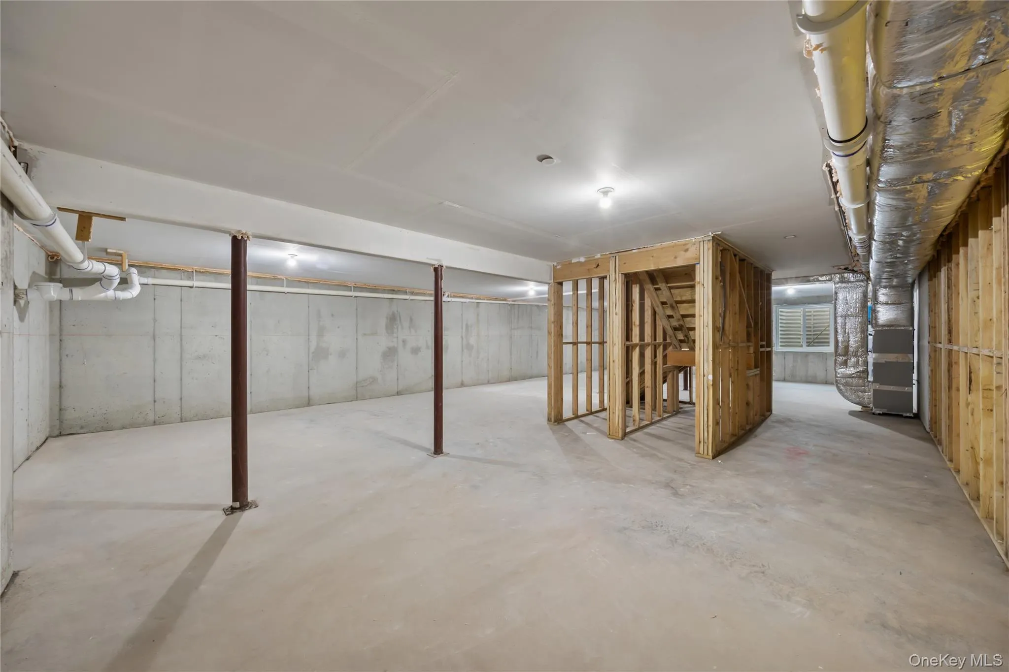 Unfinished below grade area with heating unit Unfinished below grade area with heating unit