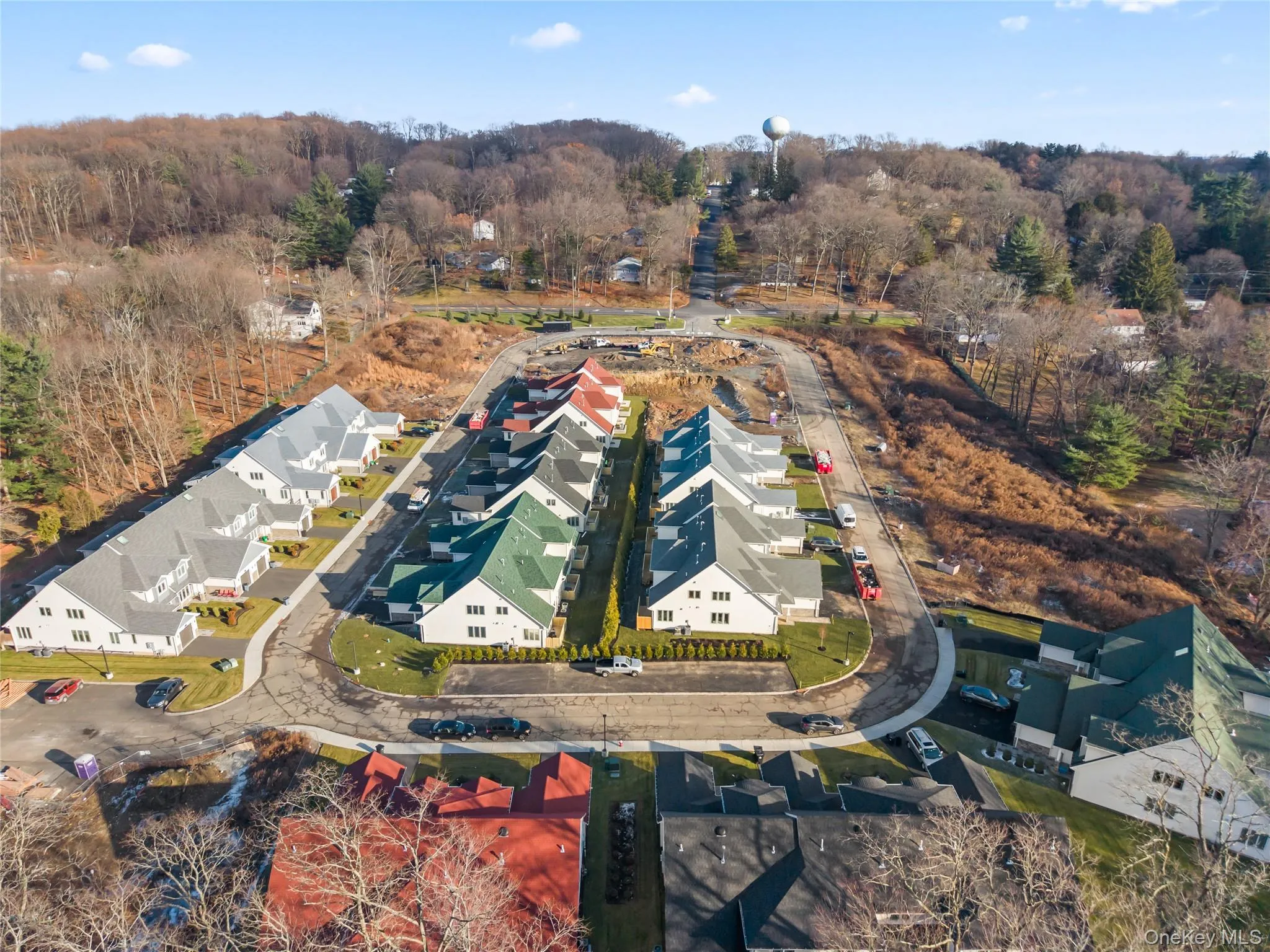 Aerial perspective of suburban area with a heavily wooded area Aerial perspective of suburban area with a heavily wooded area