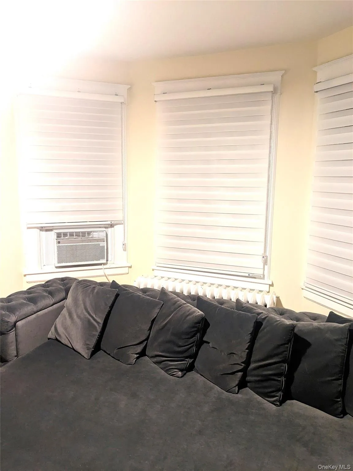 Living room featuring cooling unit Living room featuring cooling unit