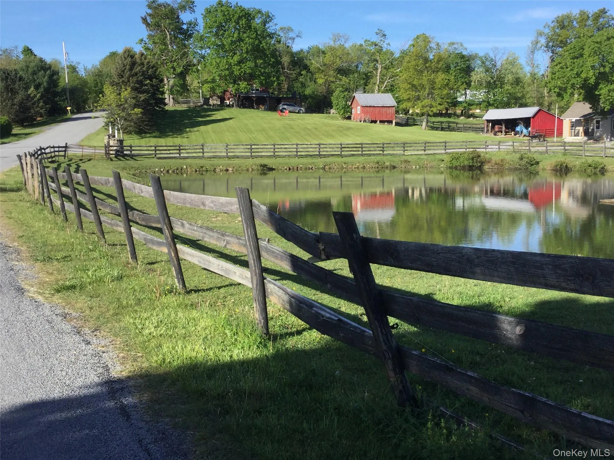 View of yard featuring a view of countryside and an outbuilding View of yard featuring a view of countryside and an outbuilding