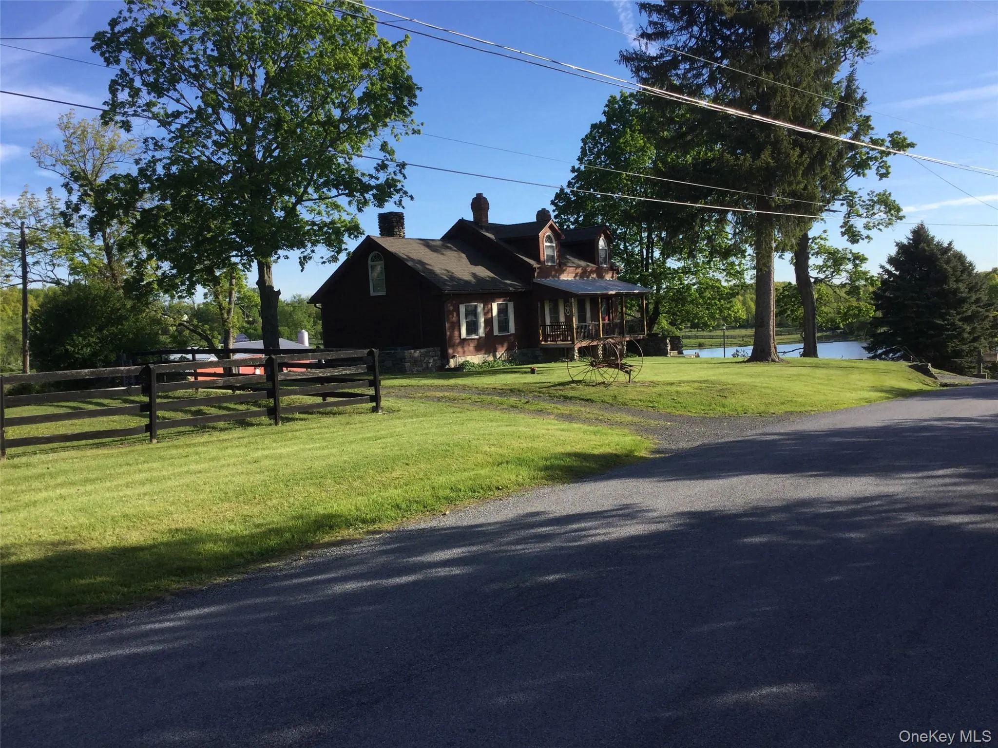 View of front of house featuring a chimney View of front of house featuring a chimney
