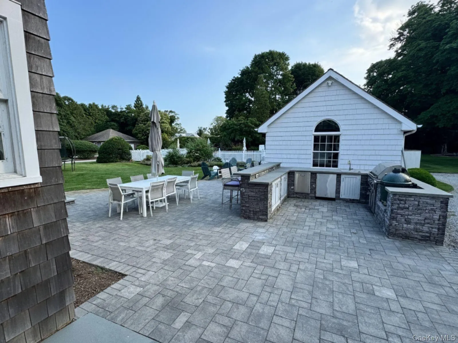View of patio / terrace with area for grilling and outdoor dining space View of patio / terrace with area for grilling and outdoor dining space