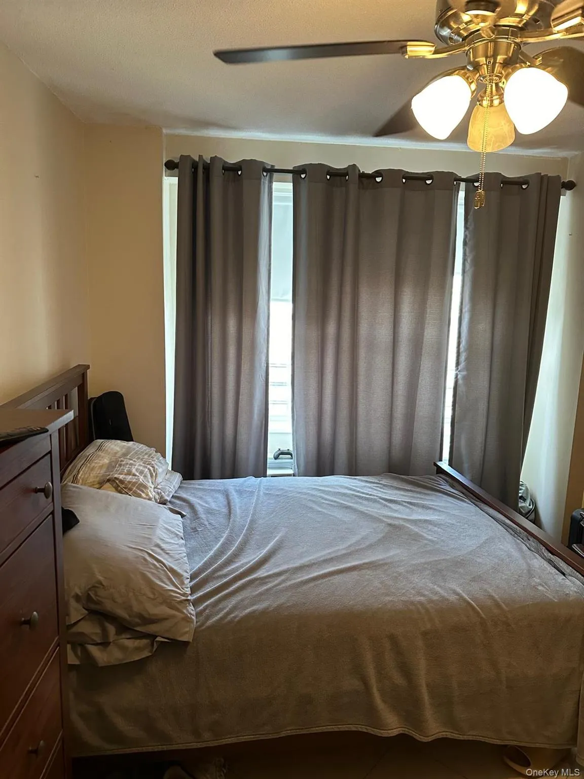 Bedroom featuring ceiling fan Bedroom featuring ceiling fan