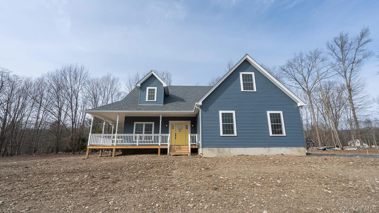 View of front of property with a porch and roof with shingles View of front of property with a porch and roof with shingles