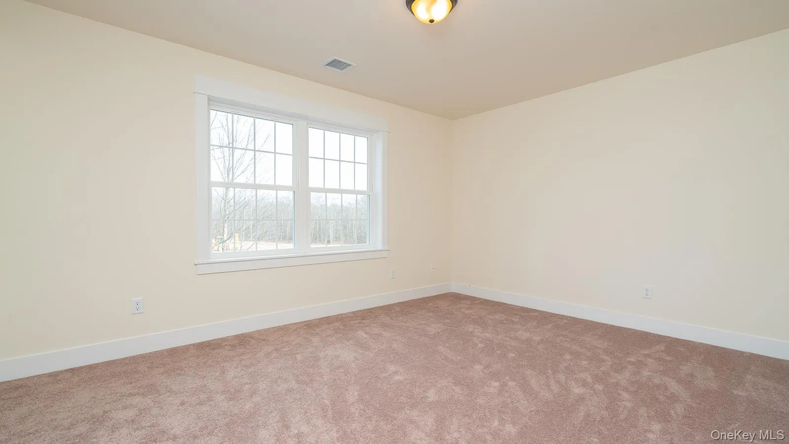 Unfurnished room featuring baseboards and carpet floors Unfurnished room featuring baseboards and carpet floors