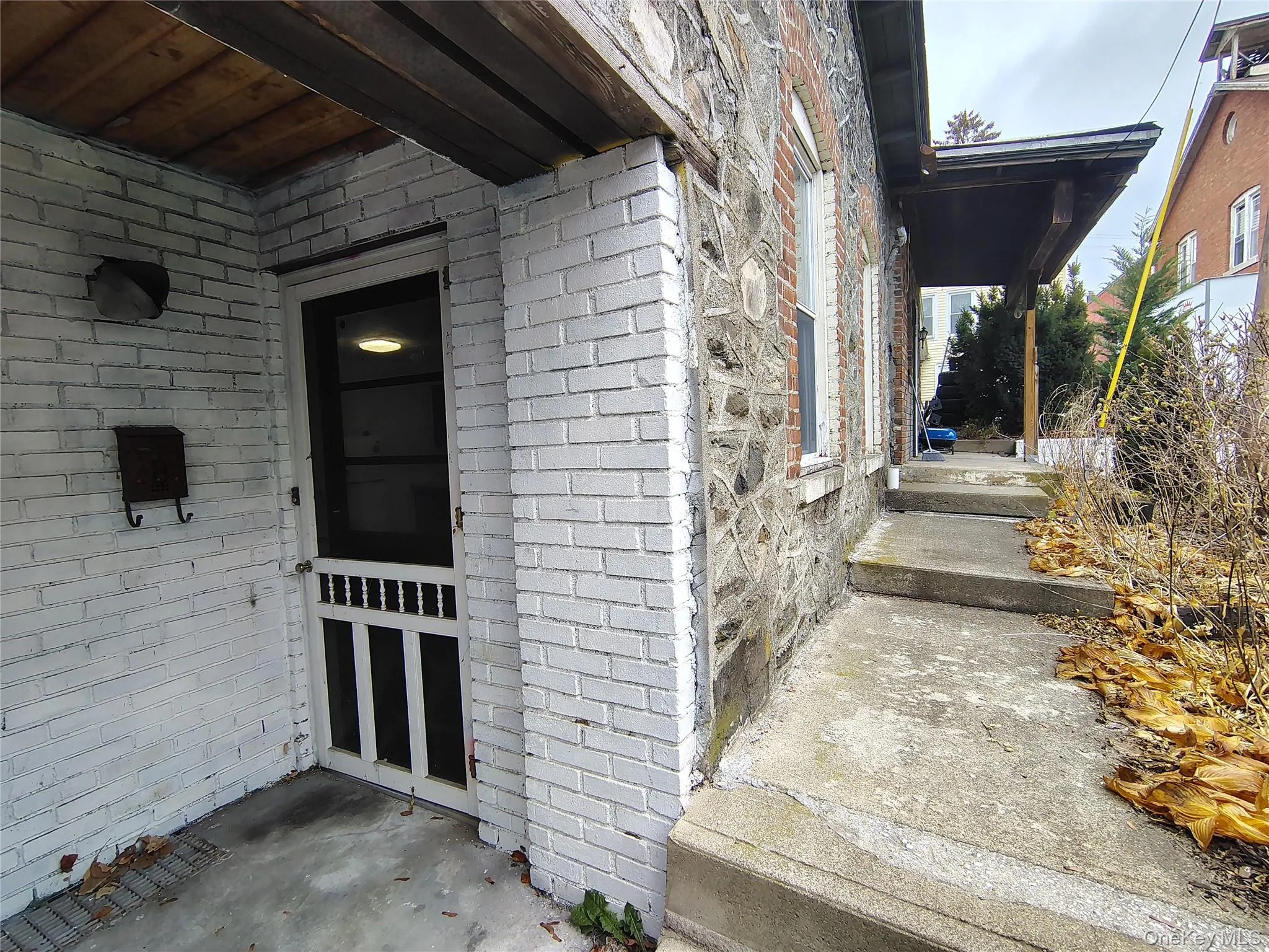 View of exterior entry featuring brick siding View of exterior entry featuring brick siding