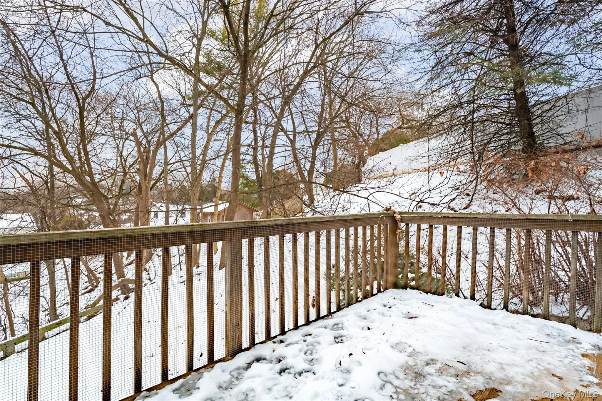 View of snow covered deck View of snow covered deck