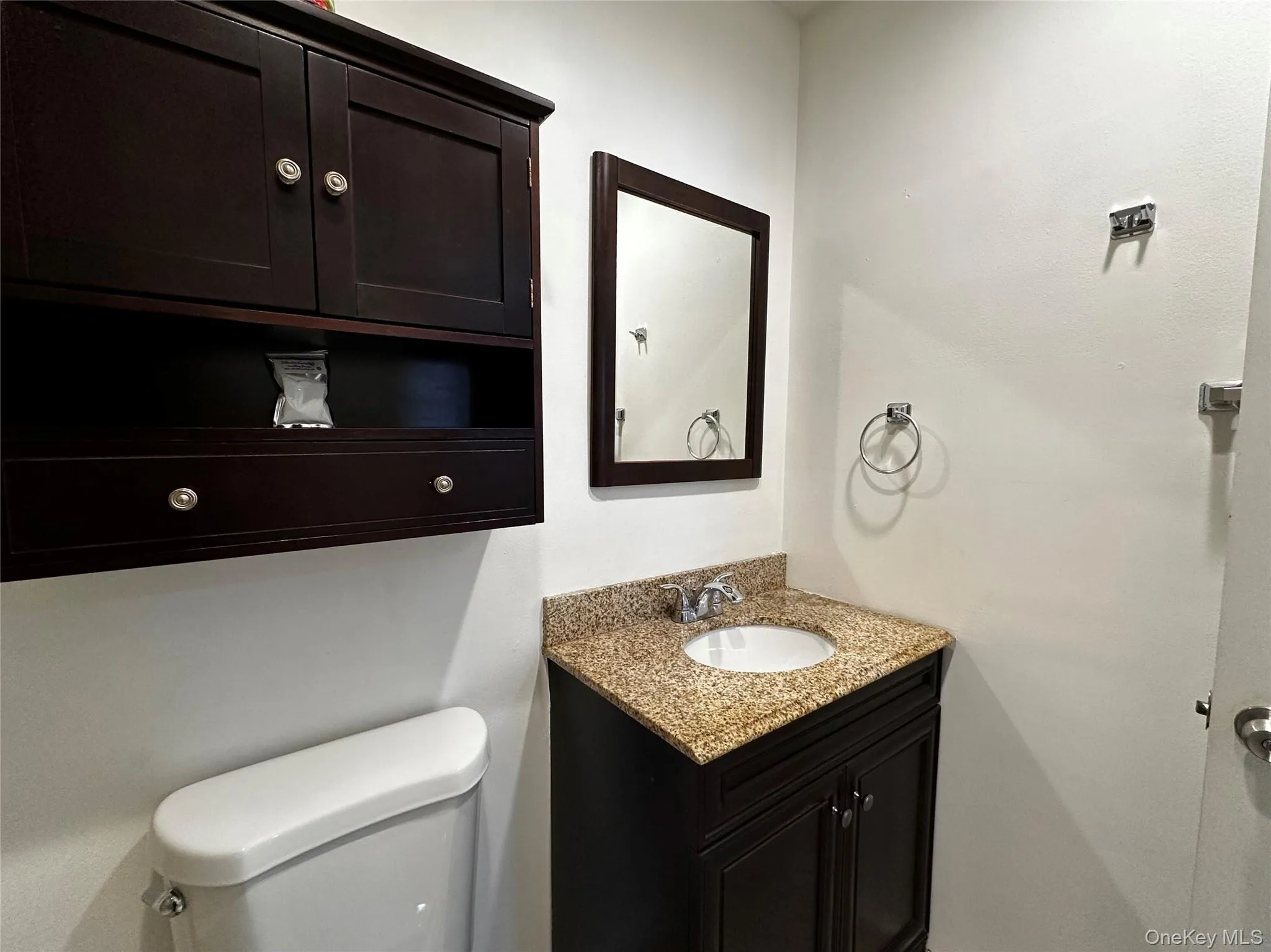 Full bath featuring vanity and toilet Full bath featuring vanity and toilet