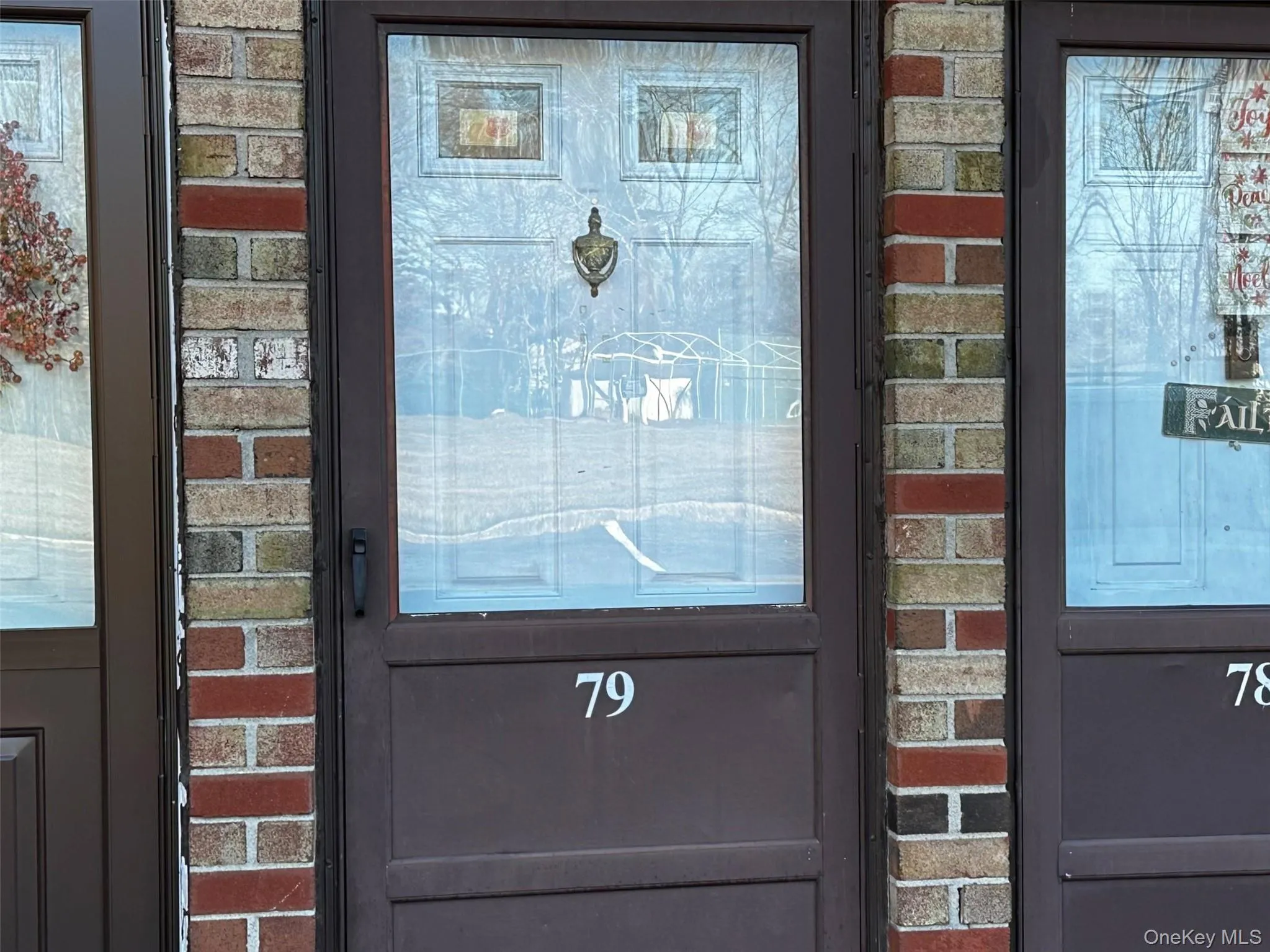 View of exterior entry featuring brick siding View of exterior entry featuring brick siding