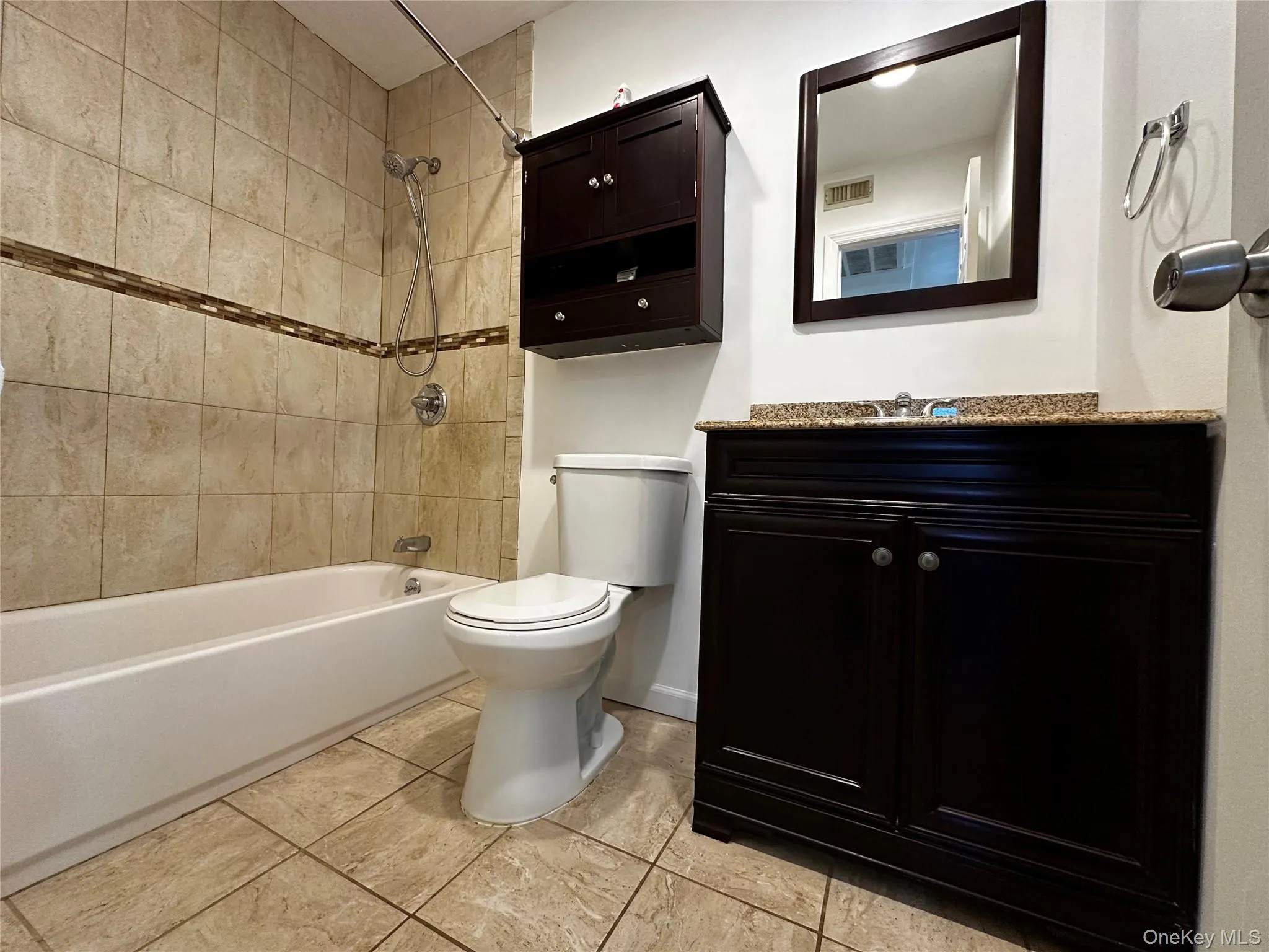 Full bath with shower / bath combination and vanity Full bath with shower / bath combination and vanity