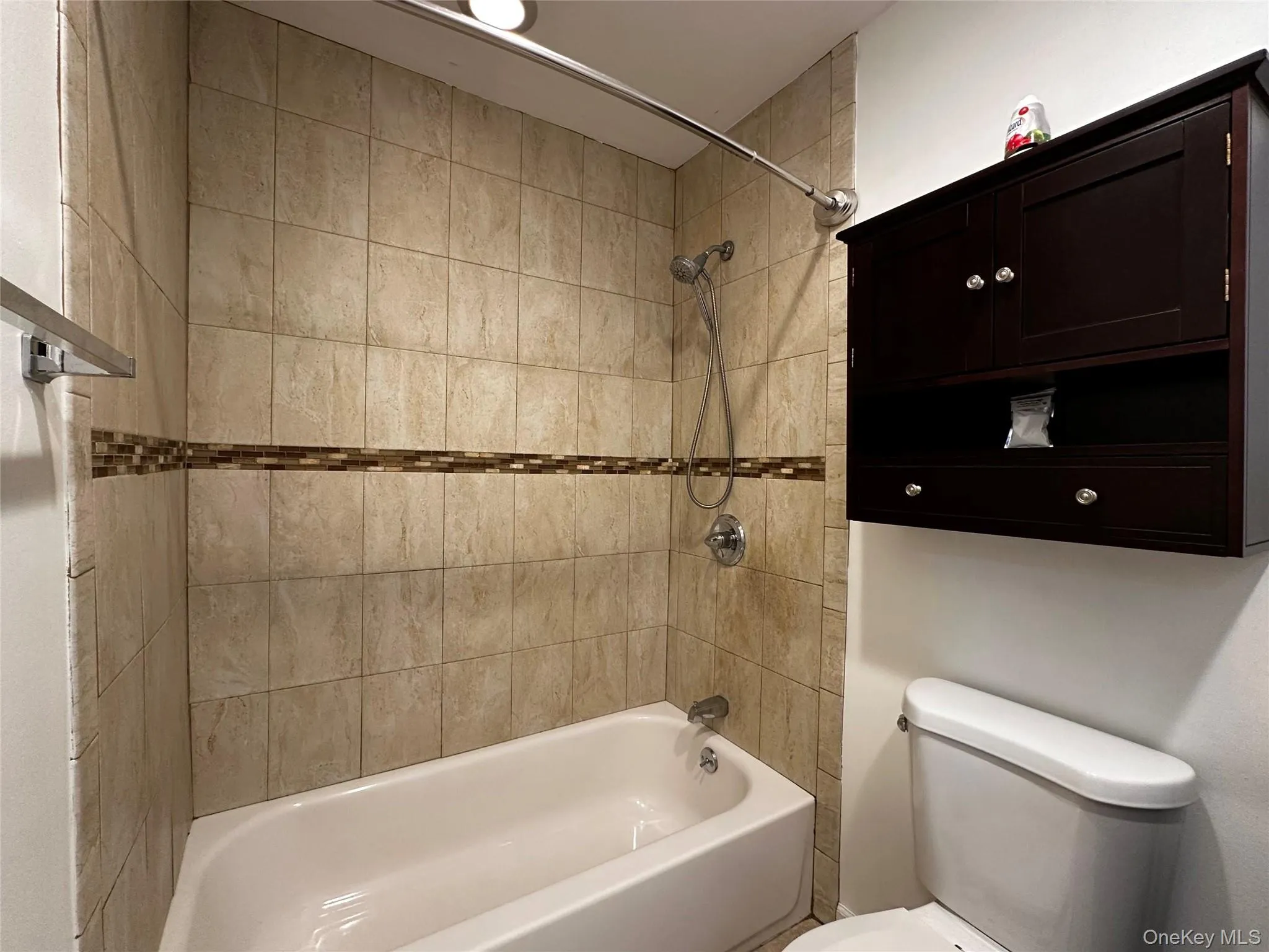 Bathroom featuring shower / tub combination. Bathroom featuring shower / tub combination.