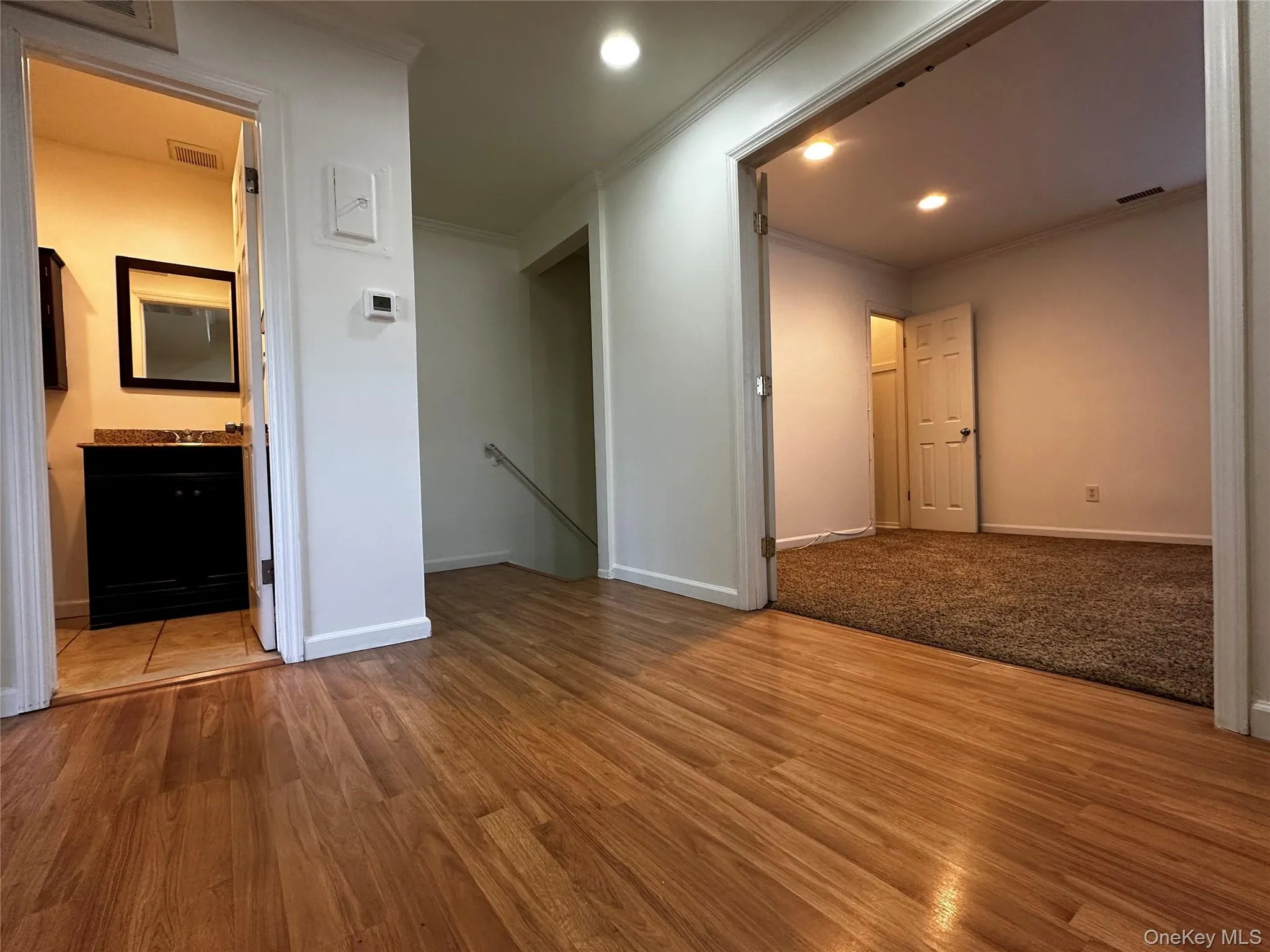 Dining room with french doors open to living room. Dining room with french doors open to living room.