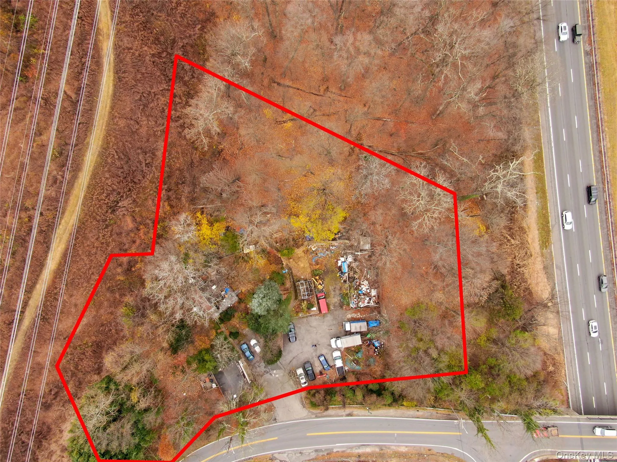 Aerial overview of property's location featuring property boundaries highlighted Aerial overview of property's location featuring property boundaries highlighted