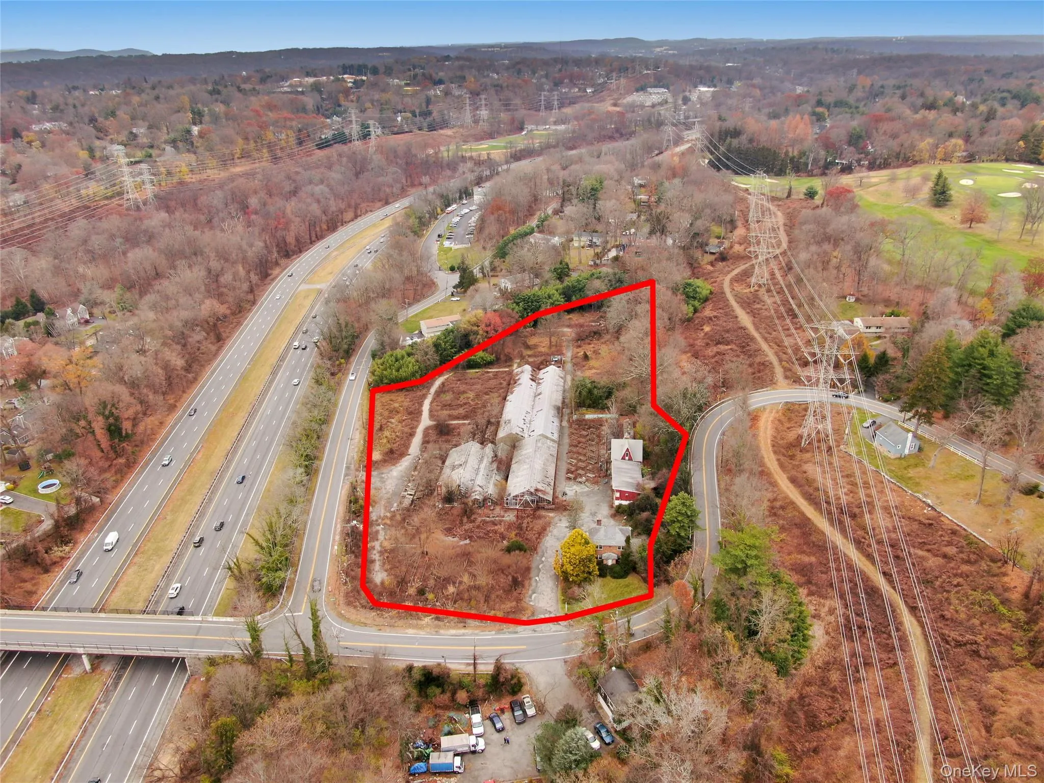 View of property location featuring property boundaries highlighted and a major roadway View of property location featuring property boundaries highlighted and a major roadway