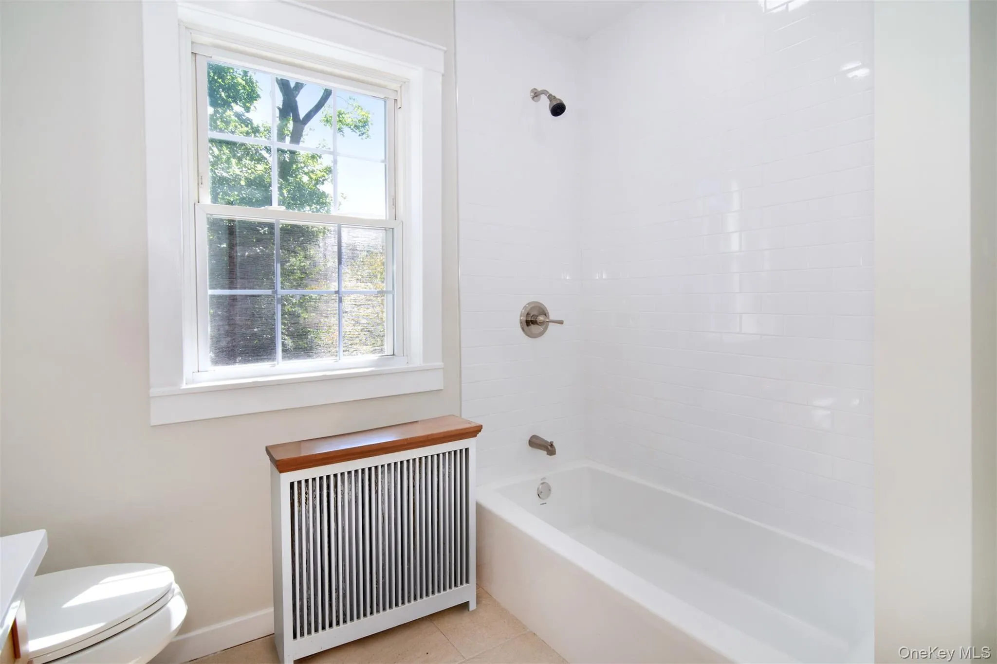 Alternate view of the spacious new bathroom. Alternate view of the spacious new bathroom.