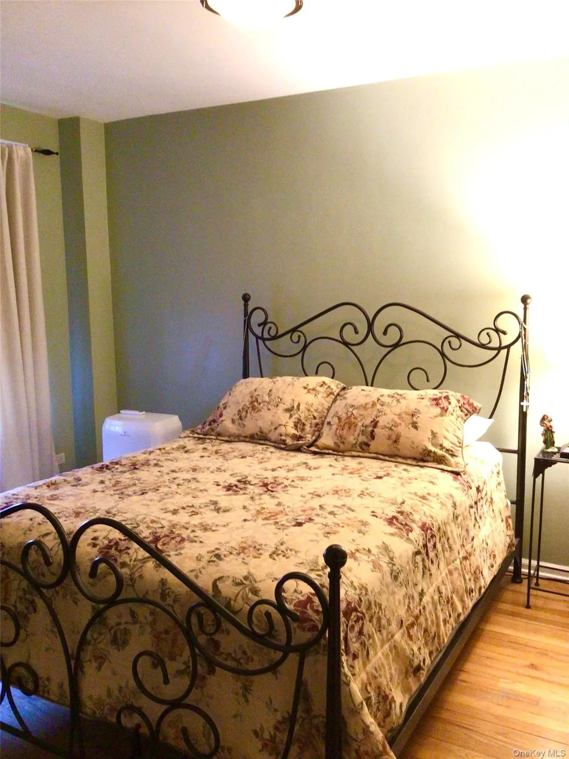 Bedroom with wood finished floors Bedroom with wood finished floors