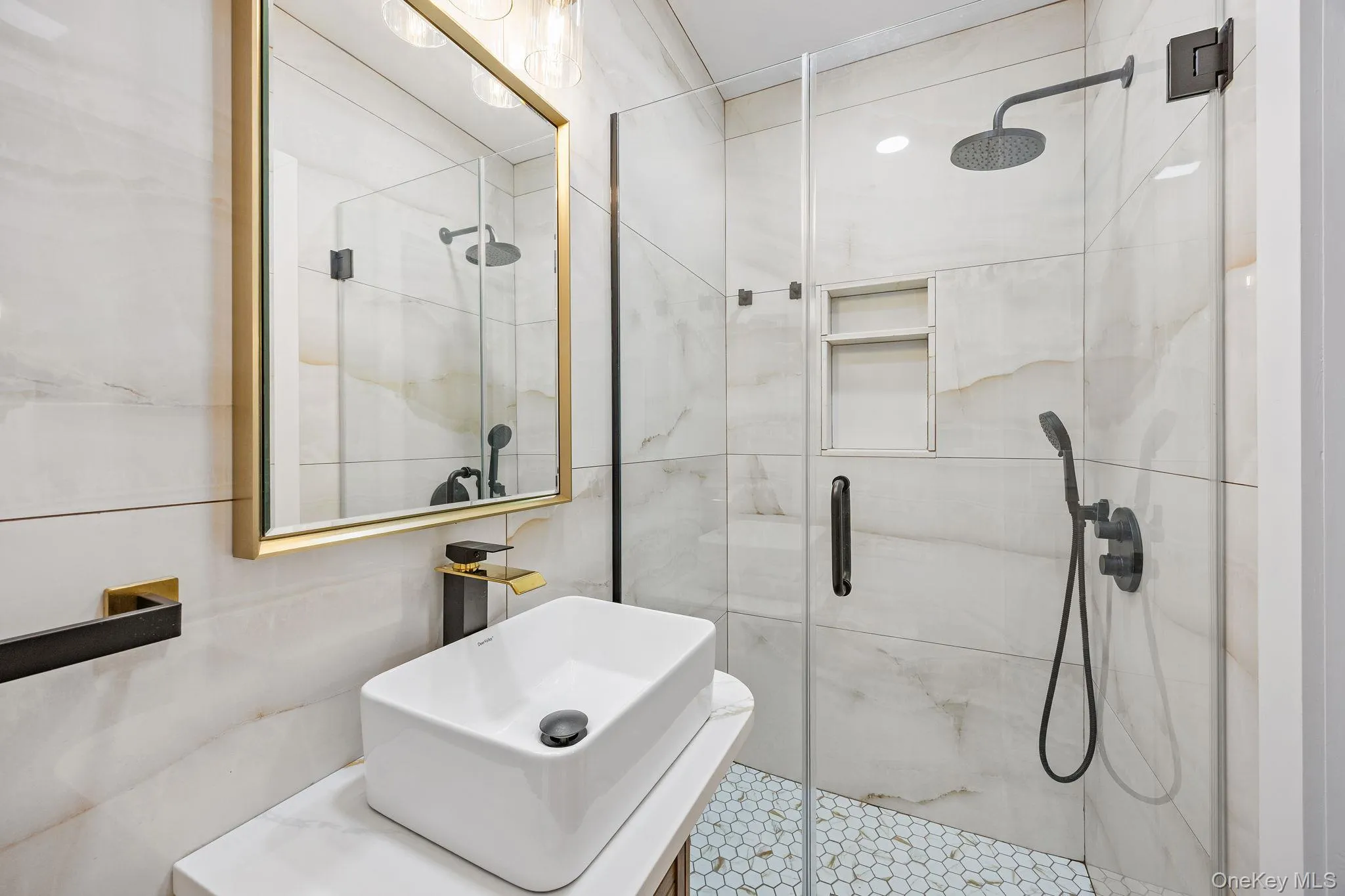 Full bathroom featuring vanity and a shower stall Full bathroom featuring vanity and a shower stall