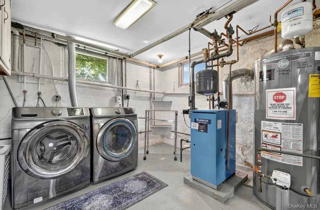 Laundry room with utility sink, window and plenty of space Laundry room with utility sink, window and plenty of space