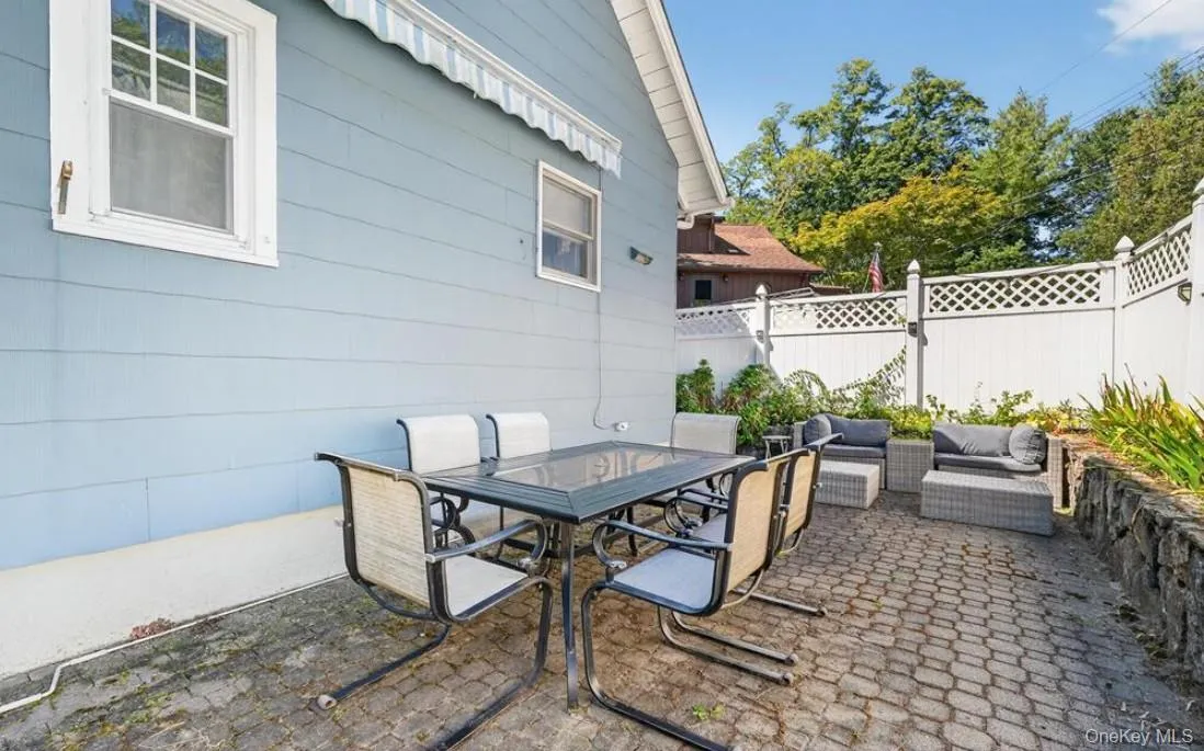 View of patio with an outdoor living space and outdoor dining area View of patio with an outdoor living space and outdoor dining area