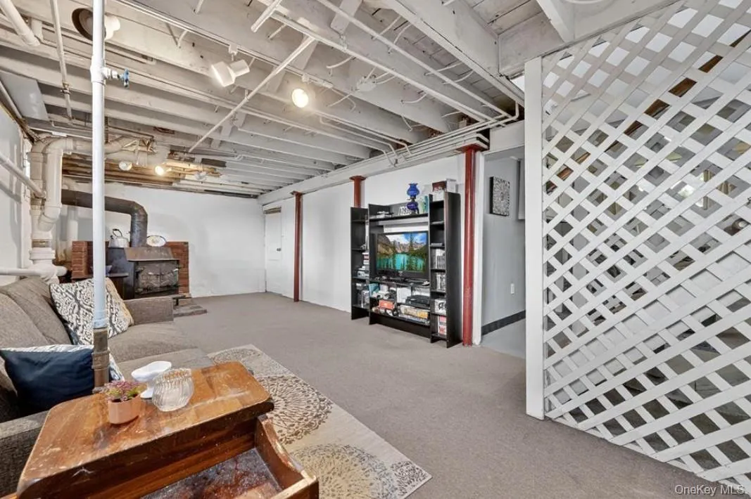 Lower level bonus space for hanging out, play or even another office Lower level bonus space for hanging out, play or even another office