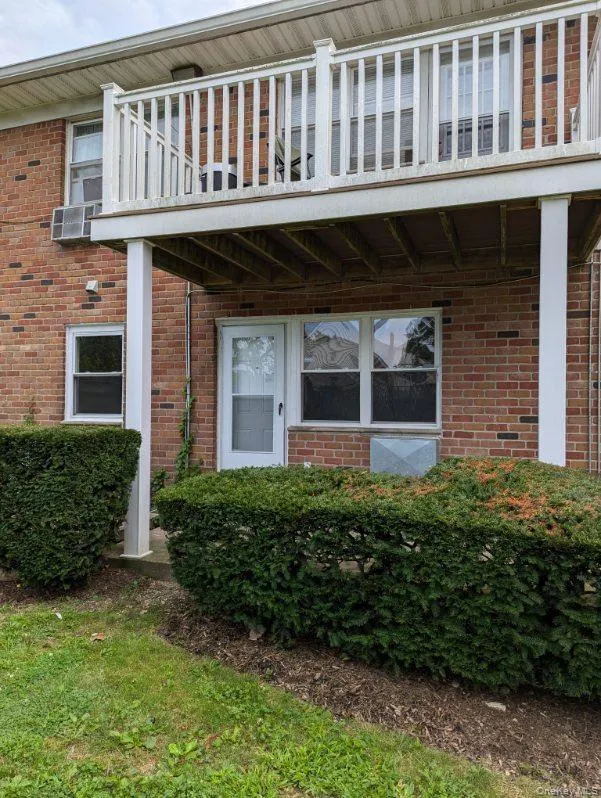 View of exterior entry featuring brick siding View of exterior entry featuring brick siding