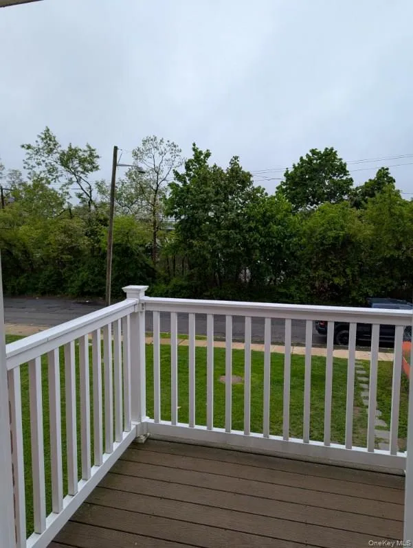 Deck featuring a yard Deck featuring a yard