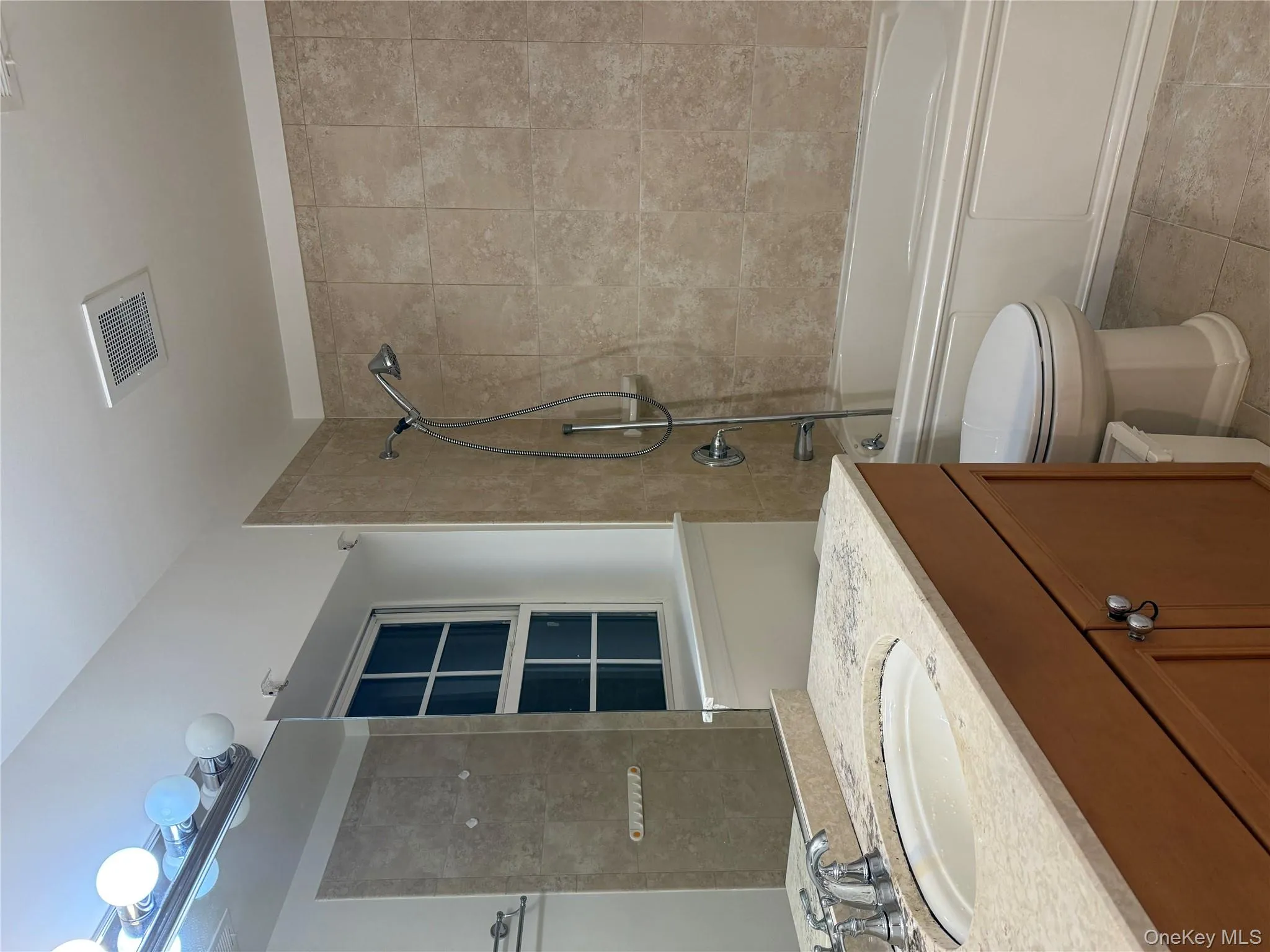 Bathroom with vanity and shower / bath combination Bathroom with vanity and shower / bath combination