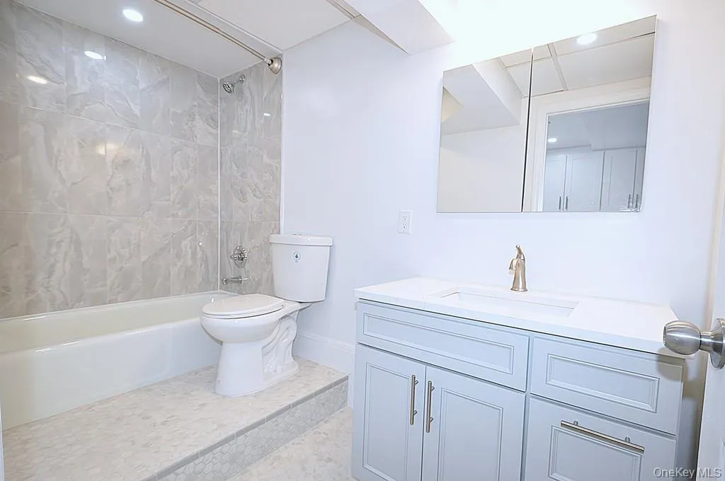 Fully renovated oversized bathroom is approx 10'- x 5' Fully renovated oversized bathroom is approx 10'- x 5'