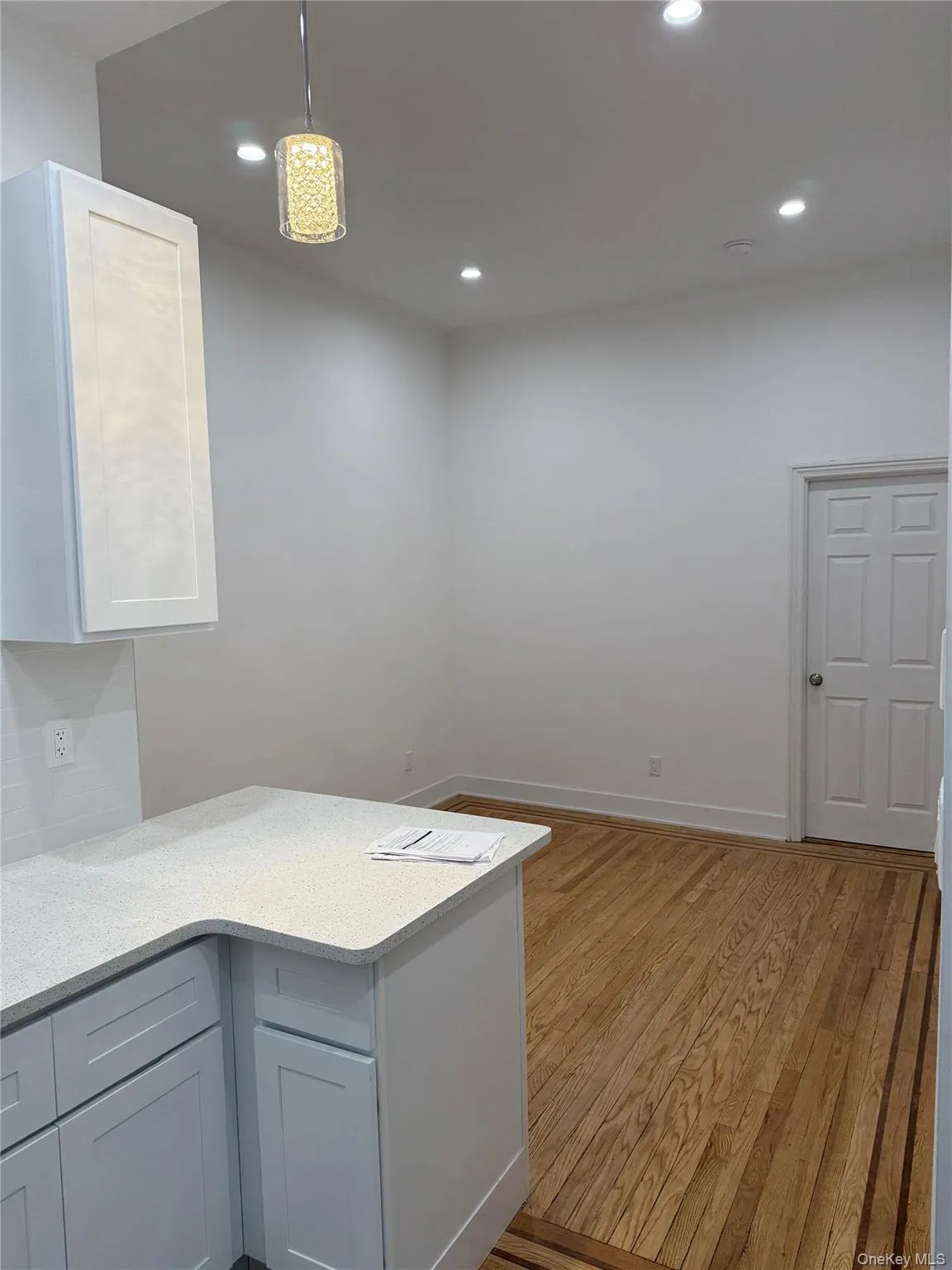 View from Kitchen into living room View from Kitchen into living room