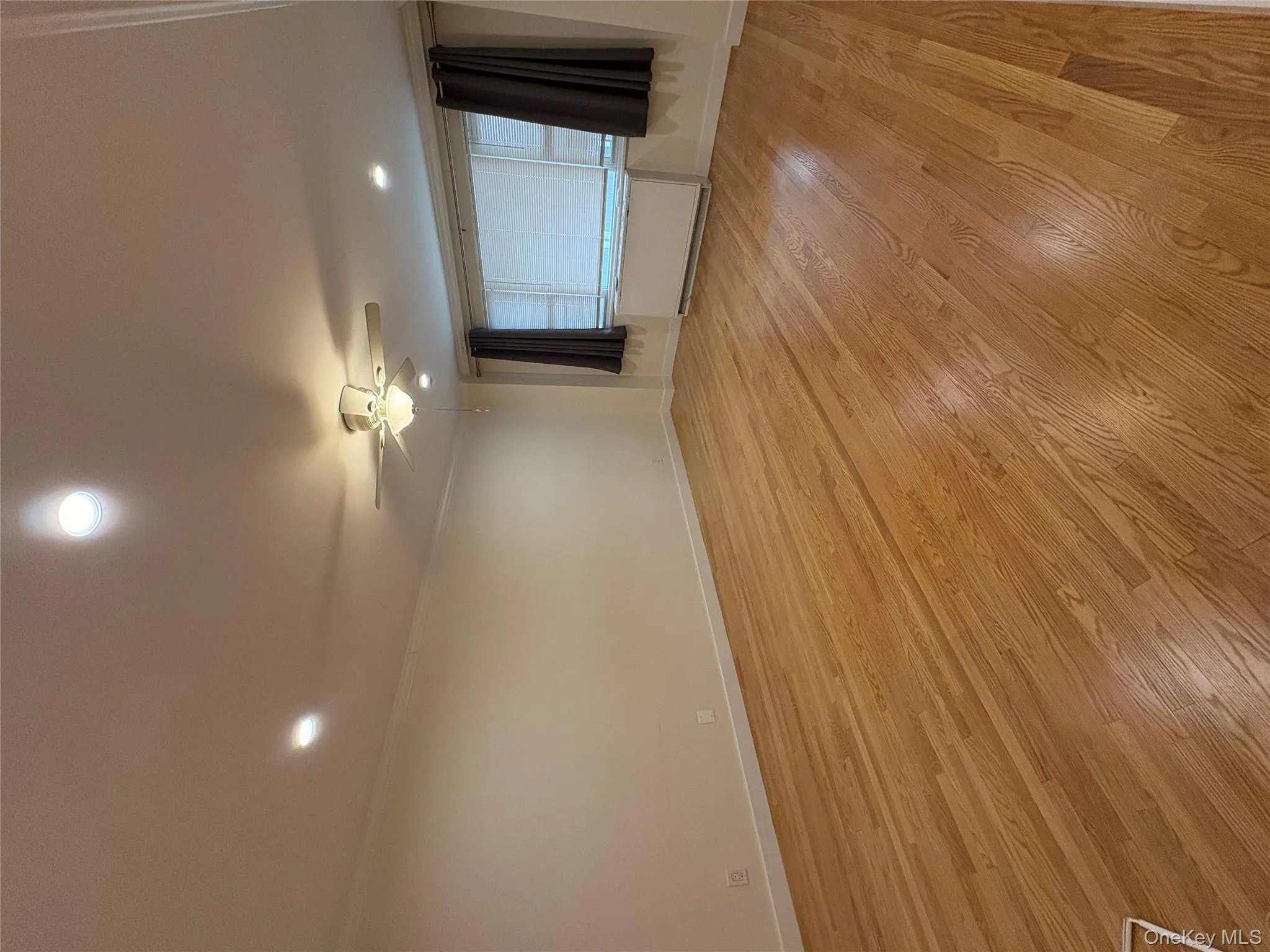 Unfurnished room featuring recessed lighting, light wood-type flooring, crown molding, and ceiling fan Unfurnished room featuring recessed lighting, light wood-type flooring, crown molding, and ceiling fan