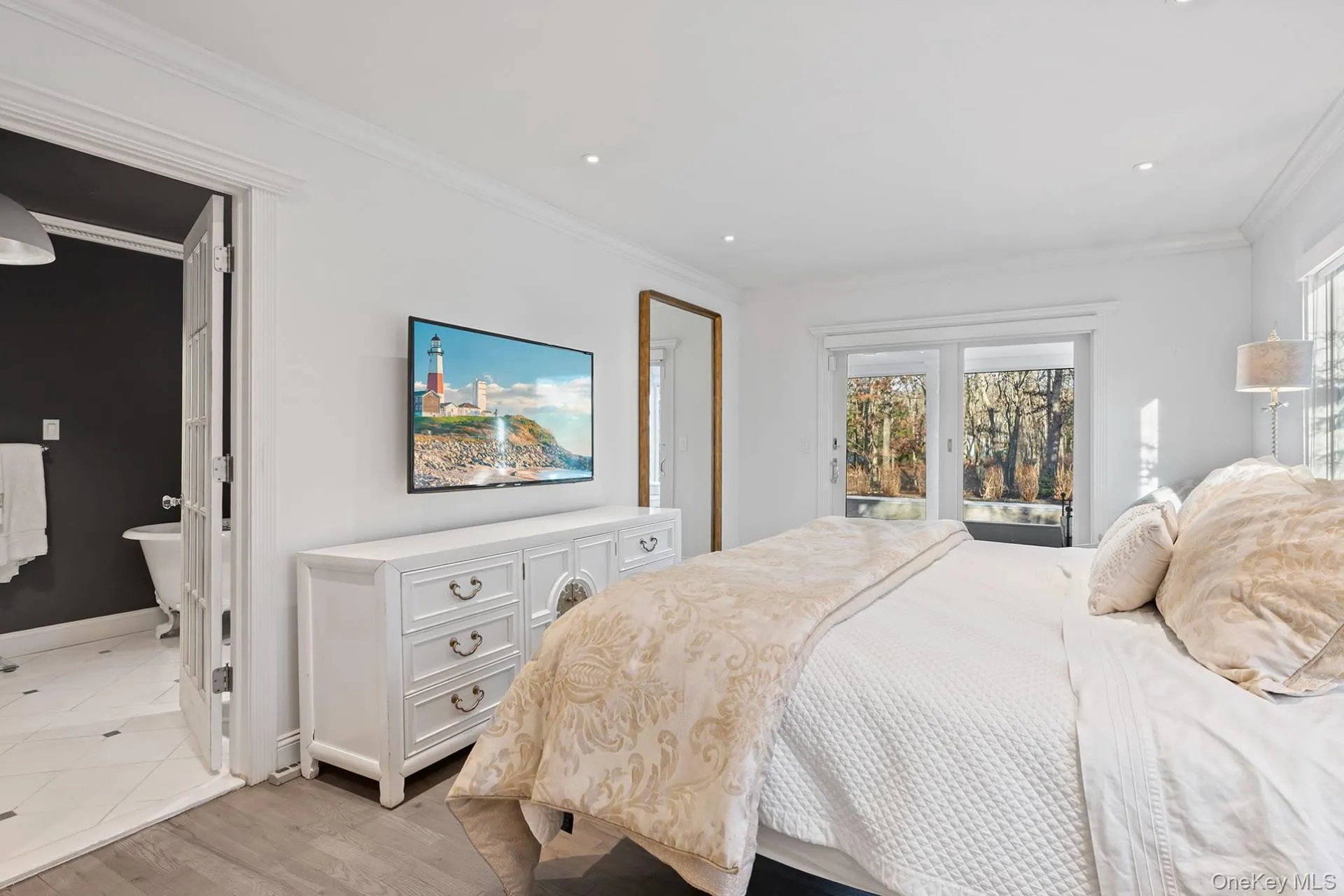 Bedroom featuring access to outside, light wood finished floors, ornamental molding, and recessed lighting