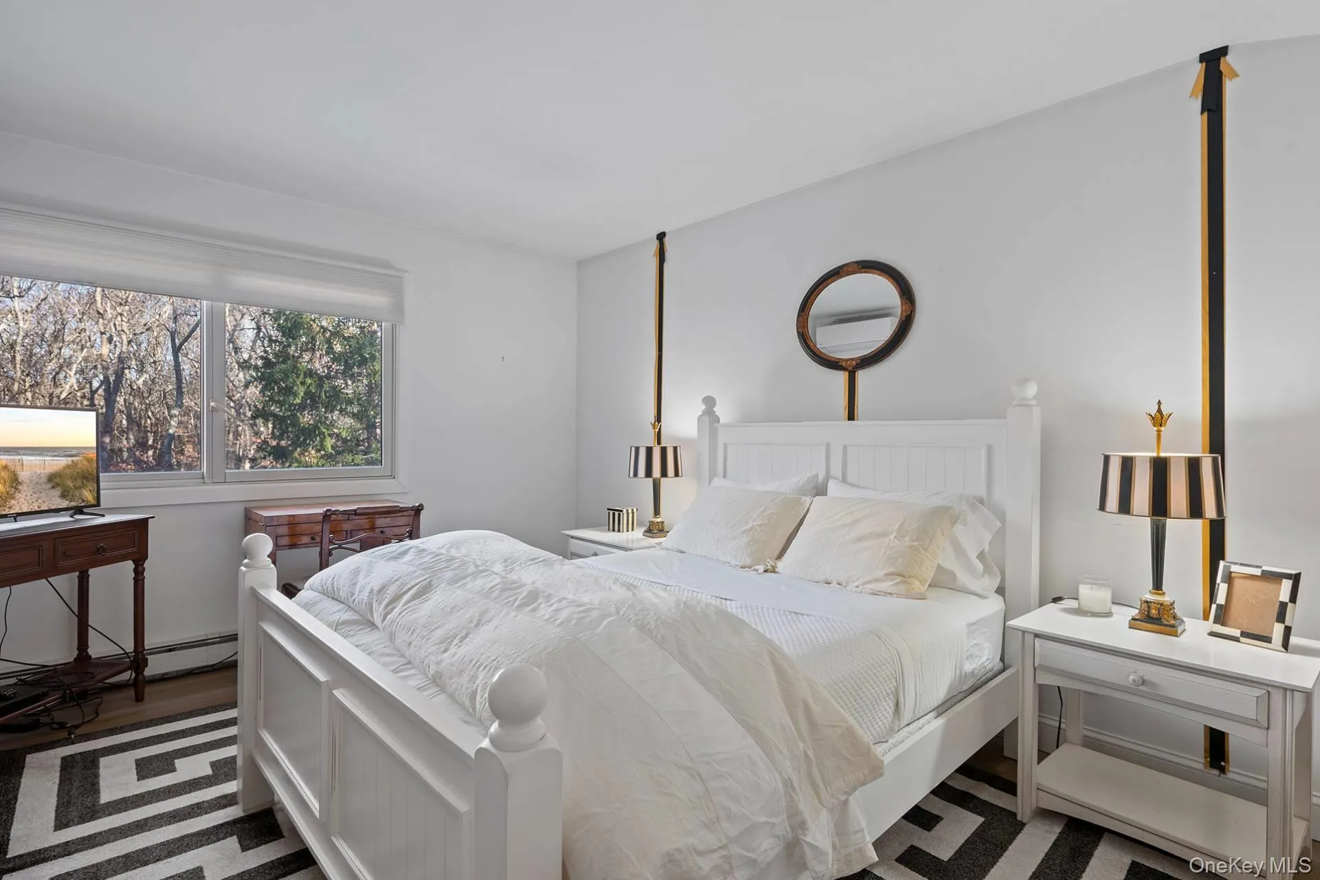 Bedroom with dark wood-type flooring