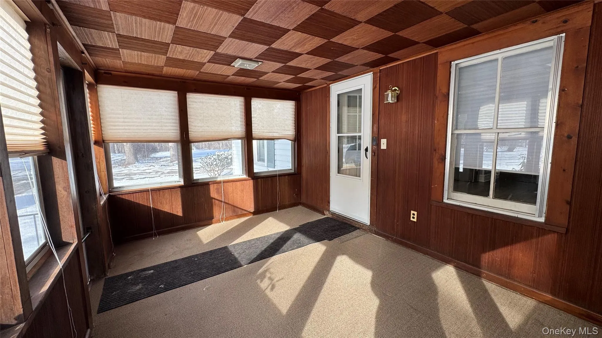 View of unfurnished sunroom View of unfurnished sunroom