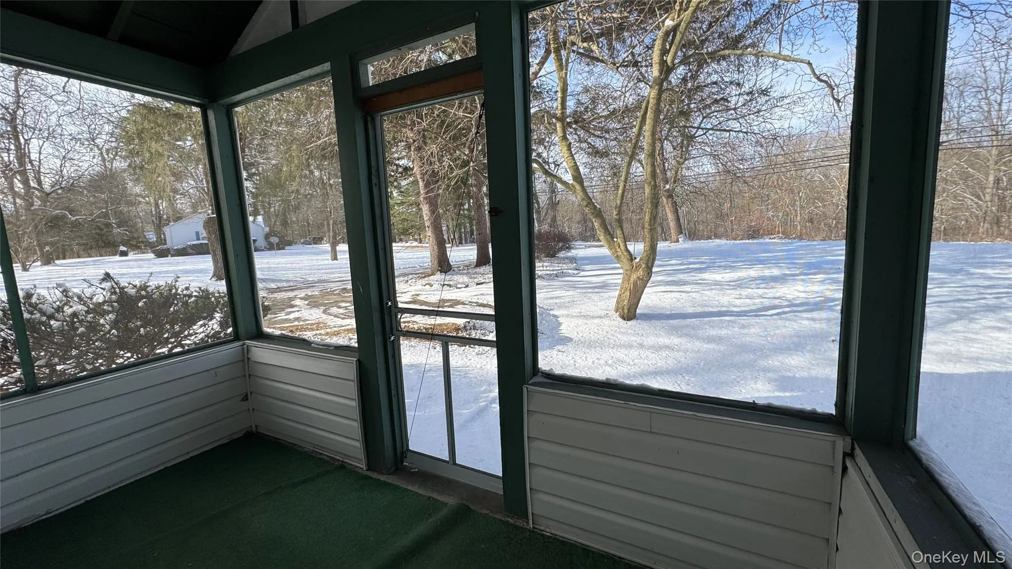 Unfurnished sunroom with plenty of natural light Unfurnished sunroom with plenty of natural light