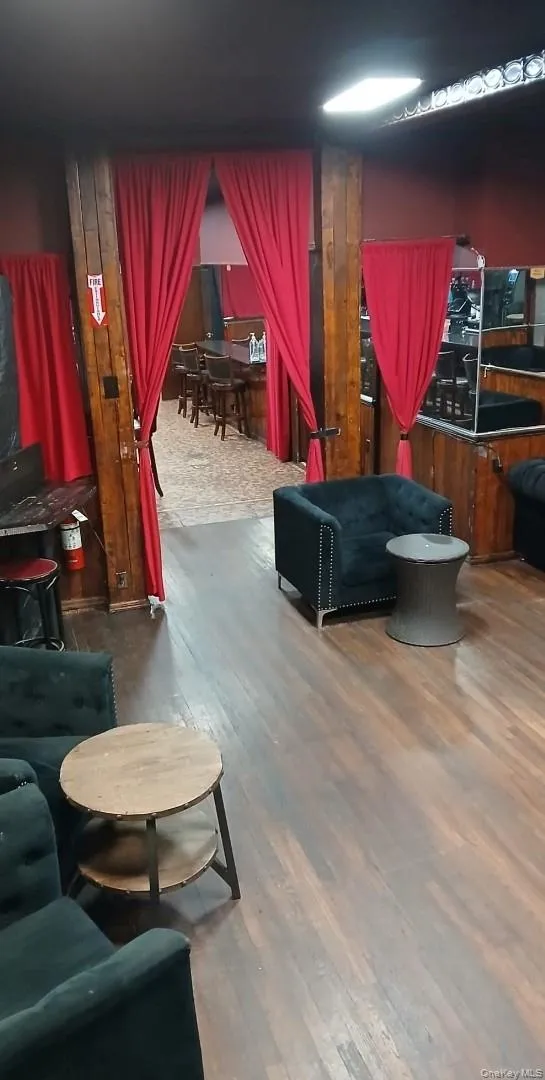 Living area featuring wood finished floors Living area featuring wood finished floors