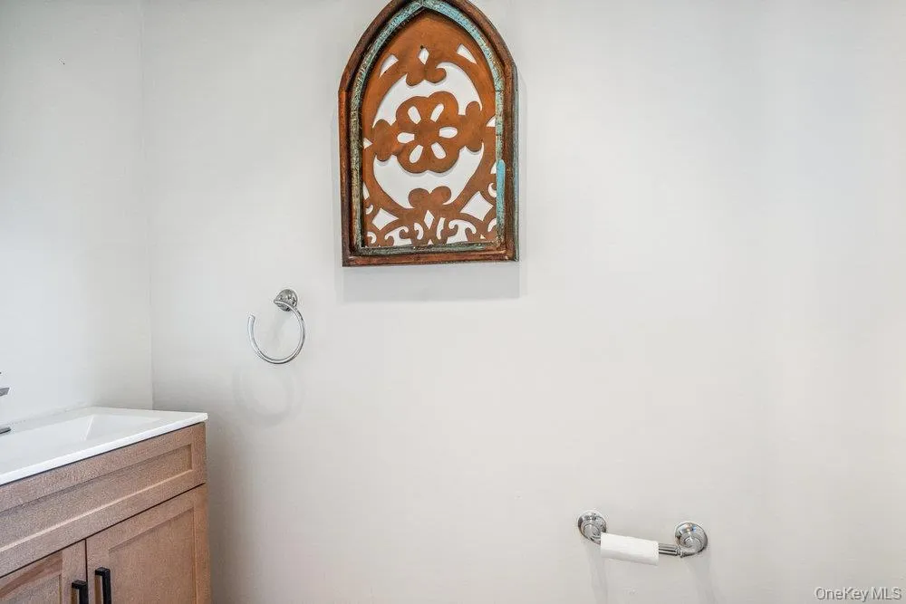 Bathroom featuring vanity Bathroom featuring vanity