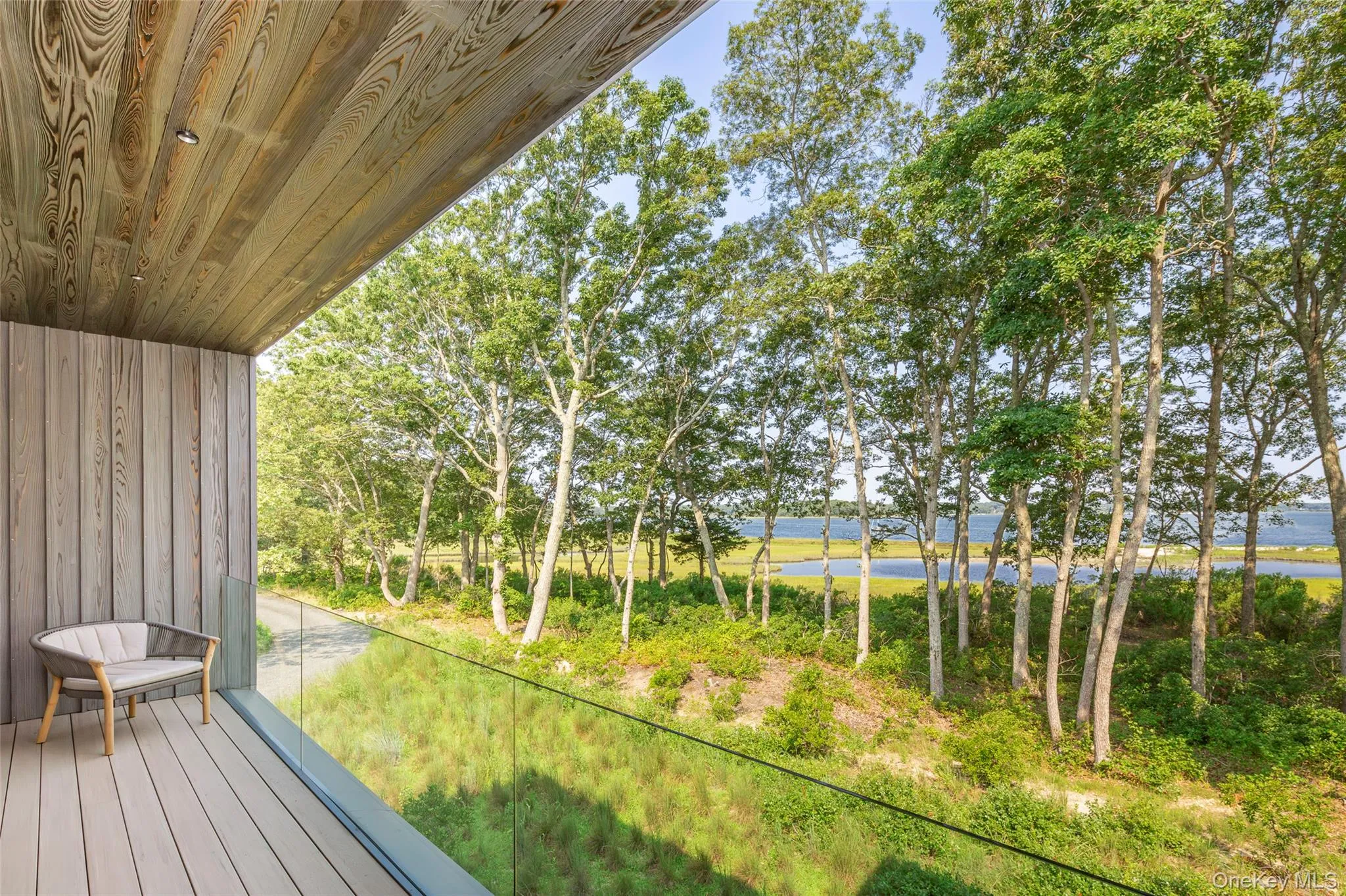 Deck featuring a water view Deck featuring a water view
