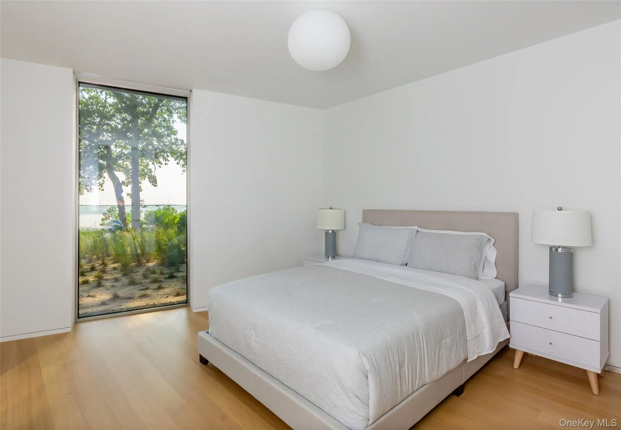 Bedroom with wood finished floors Bedroom with wood finished floors