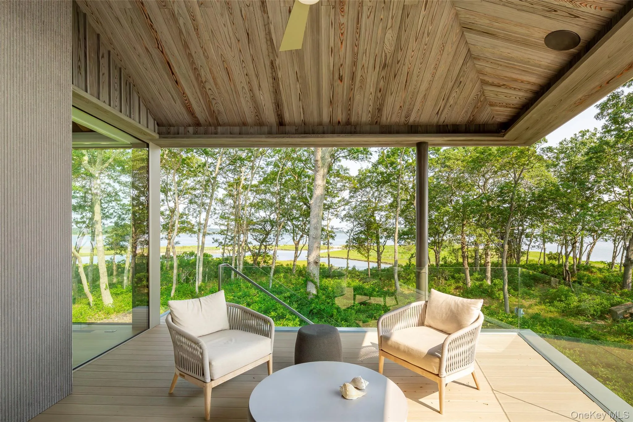 Sunroom / solarium with vaulted ceiling and healthy amount of natural light Sunroom / solarium with vaulted ceiling and healthy amount of natural light