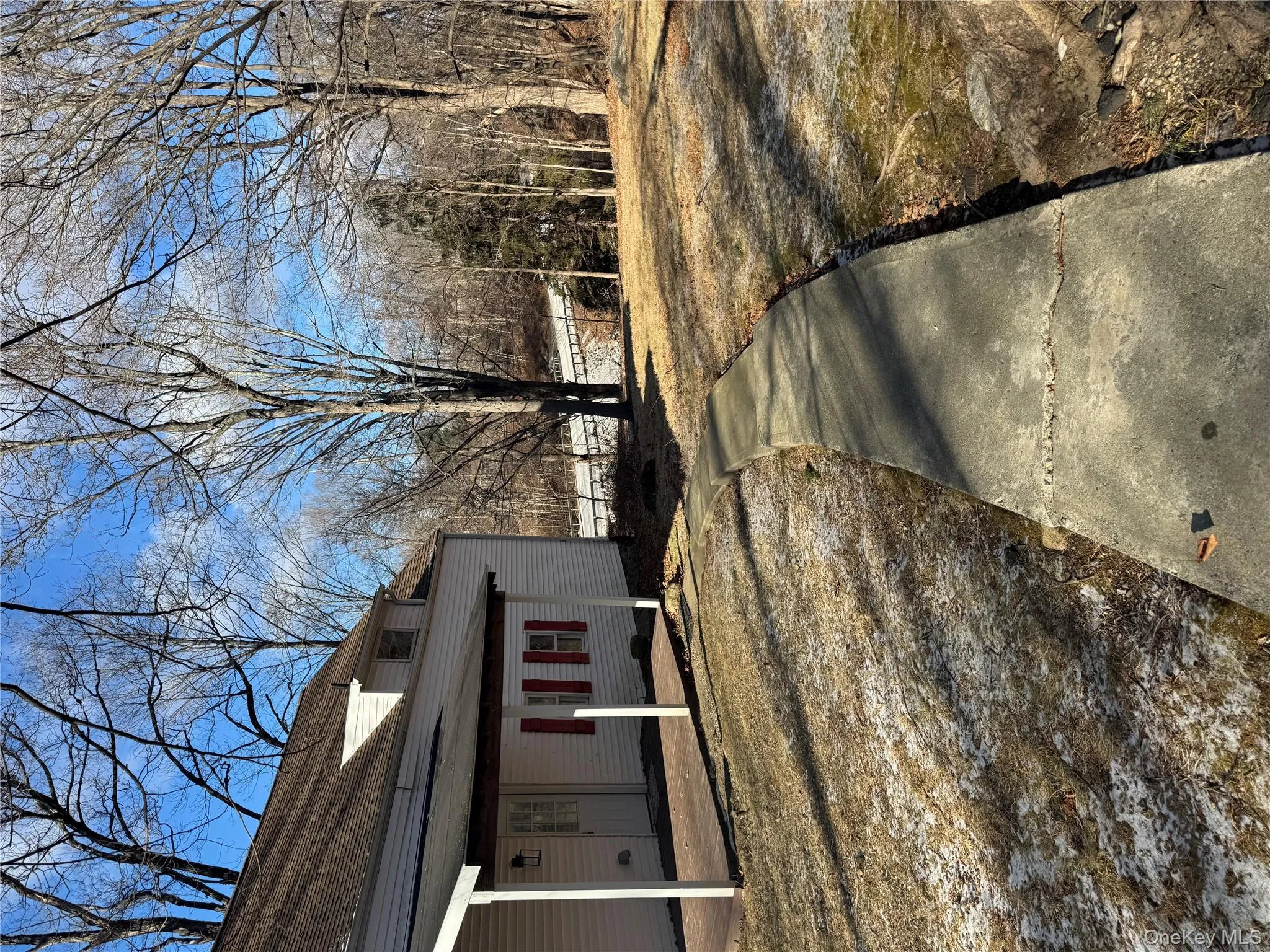 View of yard with a patio area View of yard with a patio area
