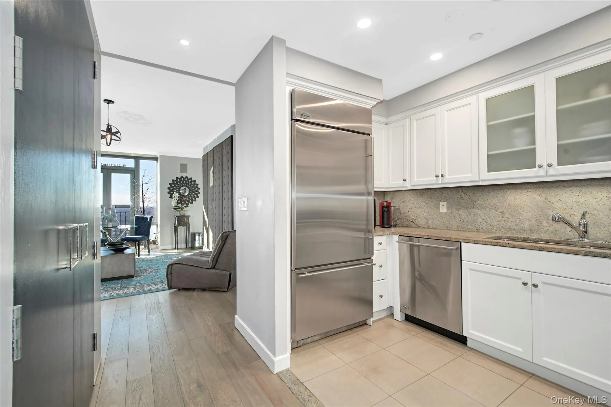 Kitchen with stainless steel appliances. Kitchen with stainless steel appliances.