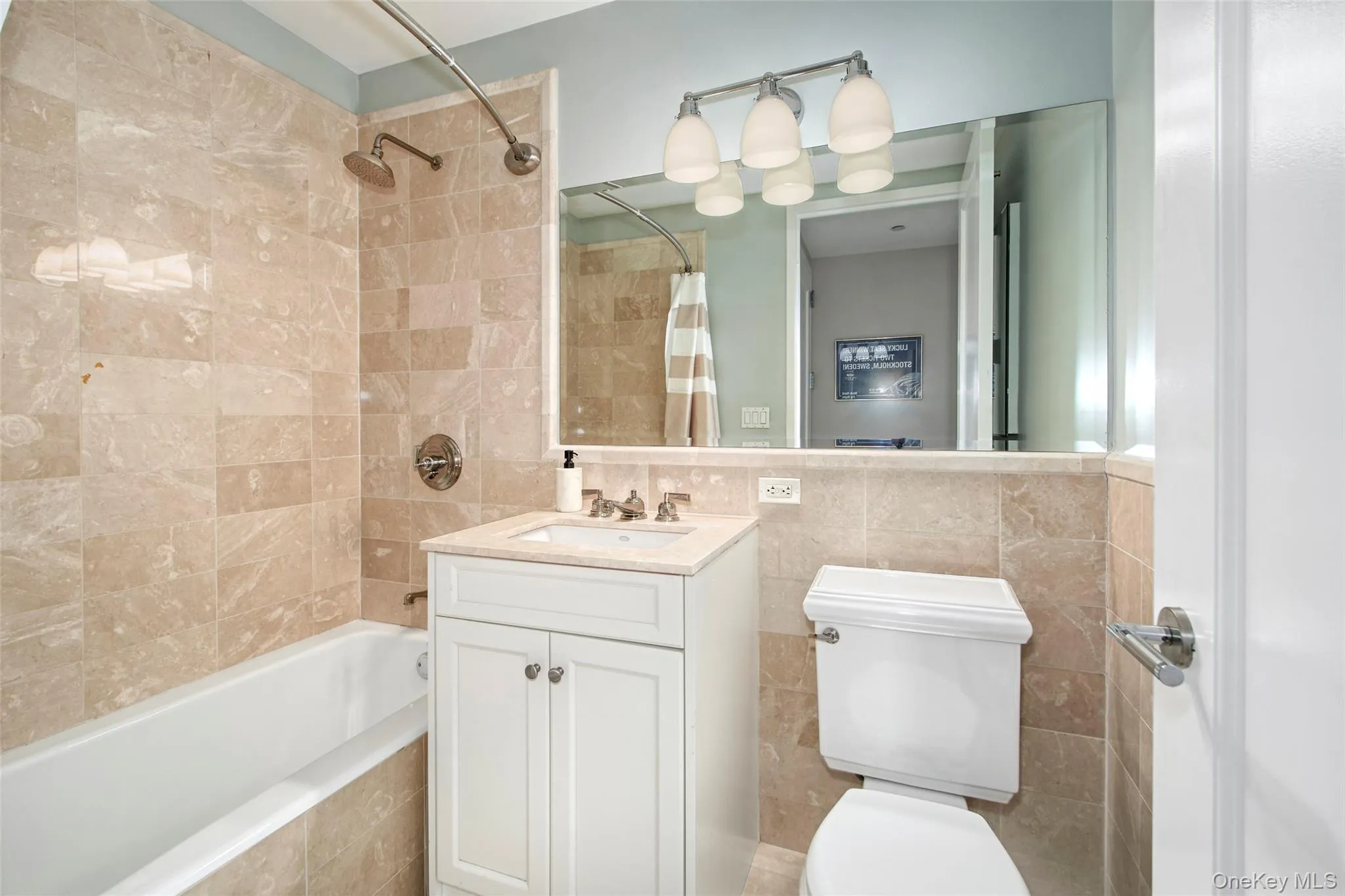 Second full bath with marble tile Second full bath with marble tile