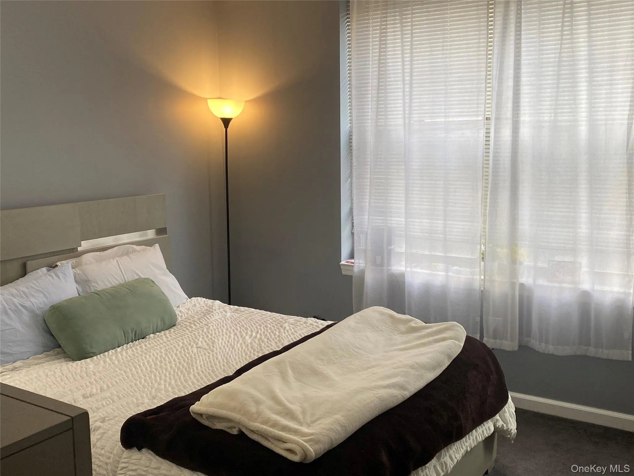 Bedroom with carpet floors Bedroom with carpet floors