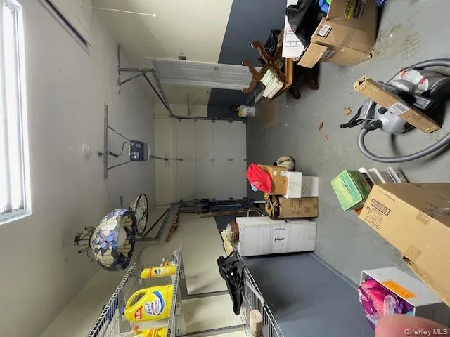 Garage featuring a garage door opener Garage featuring a garage door opener