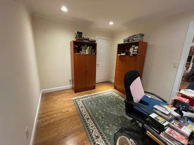 Office featuring light wood-style flooring, recessed lighting, and crown molding Office featuring light wood-style flooring, recessed lighting, and crown molding