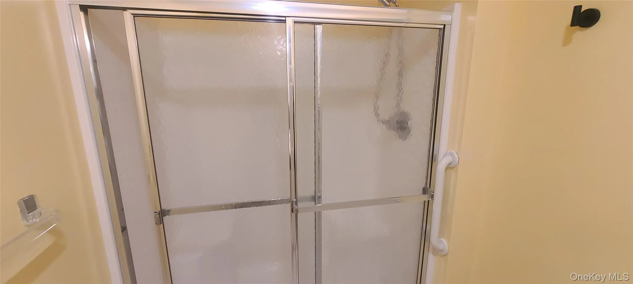 Bathroom featuring walk in shower Bathroom featuring walk in shower